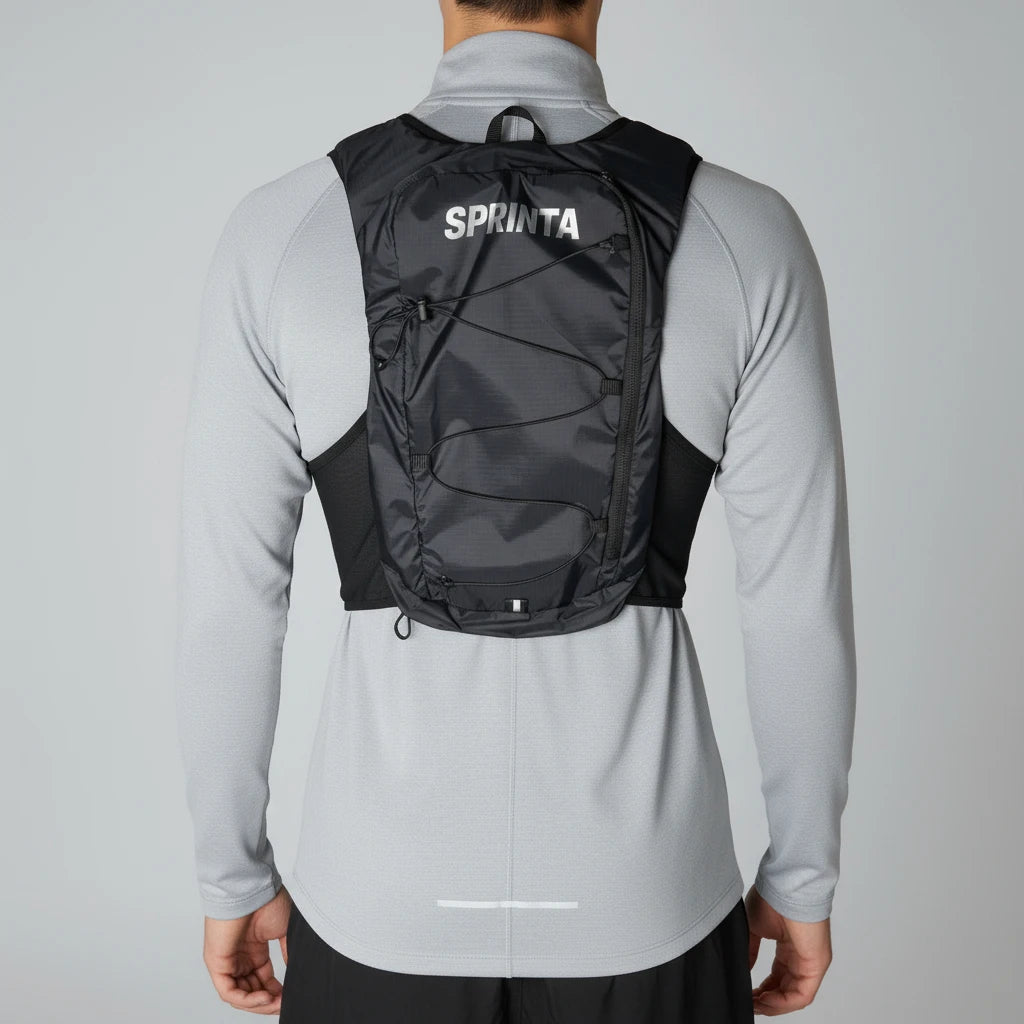 Sprinta Løbevest Air set bagfra – unisex løbevest med stor baglomme, refleksdetaljer og ventilerende mesh for maksimal komfort under løb.